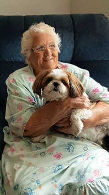 A photo of a senior and a healthy pet.