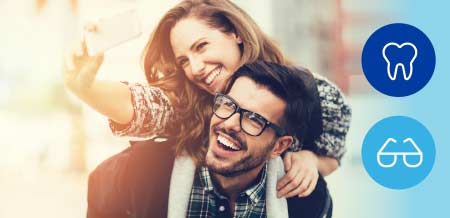A woman and a man wearing glasses