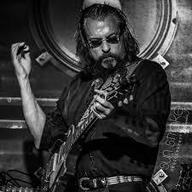 Image of Greg Golden Playing guitar